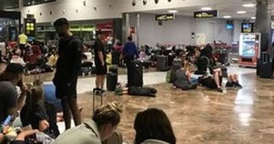 Flight passengers stuck on 'greenhouse' plane before being stranded in airport 'chaos'