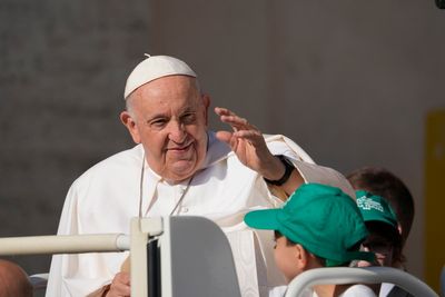 Pope appears at general audience after hospital checkup