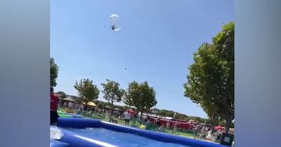 Heartstopping video shows moment boy fell out of the sky in inflatable zorb ball horror