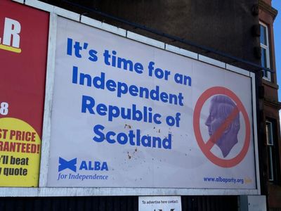 Outrage after 'excrement' smeared on Alba Party anti-monarchy billboard