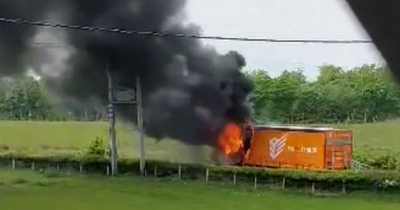 Lorry bursts into flames on Lanarkshire road as person rushed to hospital