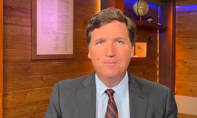 Tucker Carlson peddles conspiracy theories on Twitter debut from barn