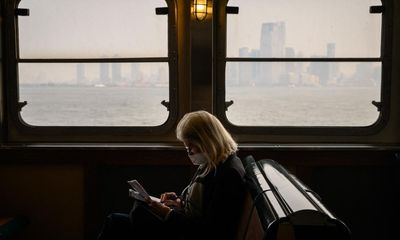 ‘It’s too much’: New Yorkers don masks or stay inside amid smog crisis