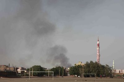 Arms depot battle rages in Sudan as fuel facility burns