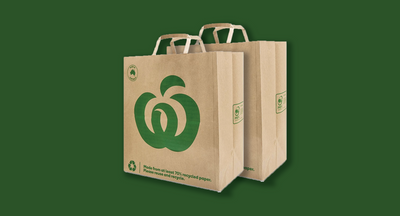 Woolworths quietly abandons promise to make all paper bags in Australia