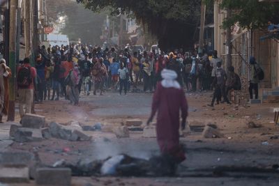 Senegal's president calls for an investigation into deadly clashes, says he's open to dialogue