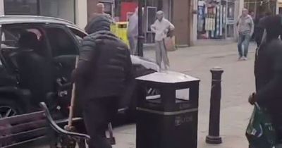Moment masked axe-wielding thieves raid Leeds jewellers in broad daylight in front of shocked shoppers