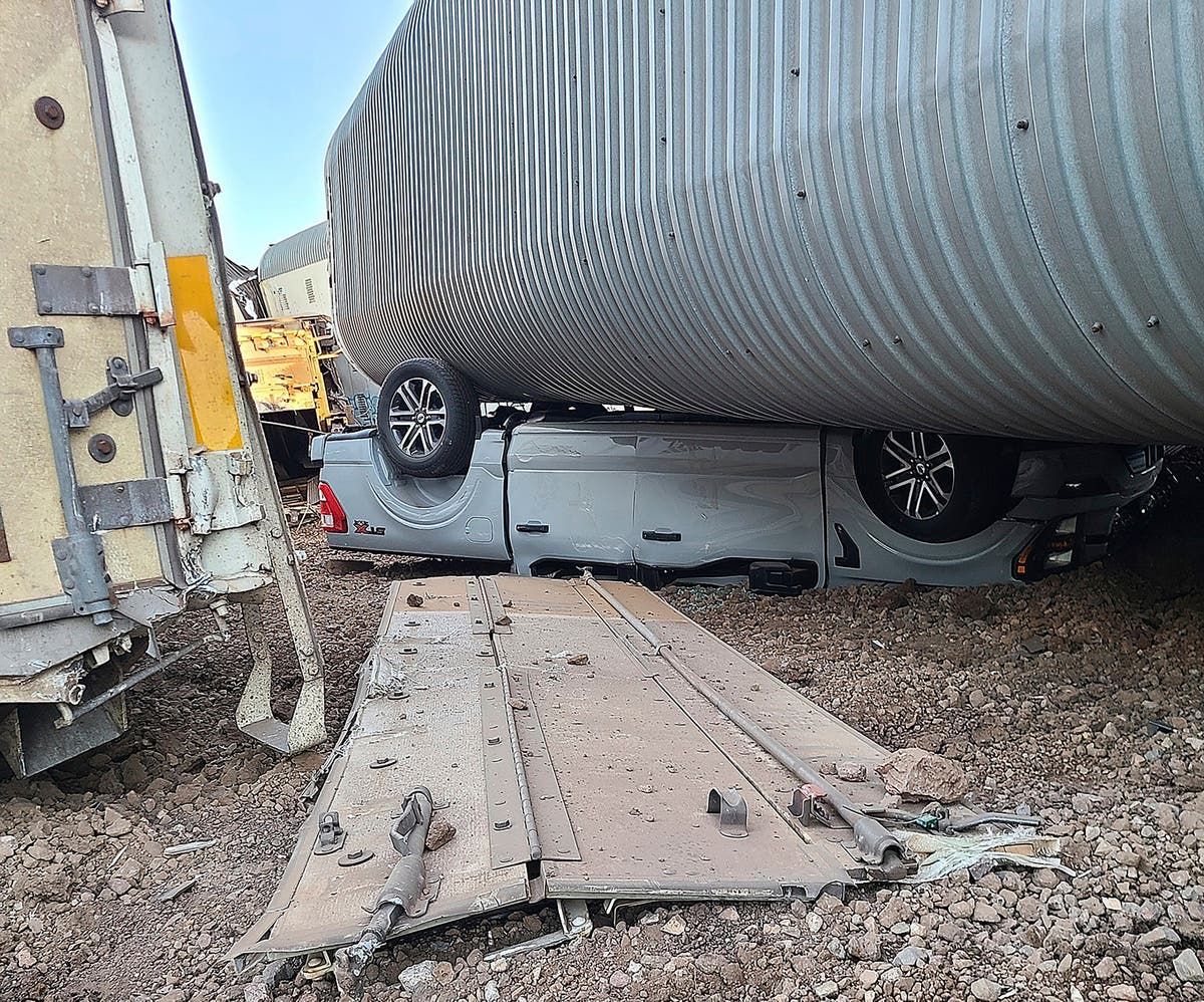 23 freight cars, new vehicles heavily damaged in train…