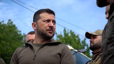 Russian forces attack flooded city after Zelensky visit, says Ukraine