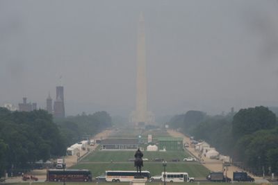 Smoke from Canadian wildfires cloaks eastern US with haze