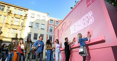 Aldi has a billboard which dispenses rosé as pink wine season begins