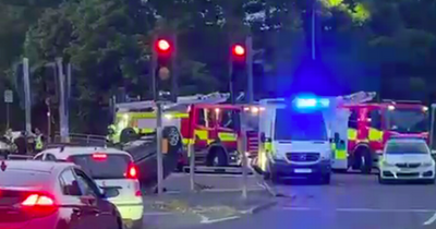 Glasgow crash on busy road as car flips on roof and man rushed to hospital