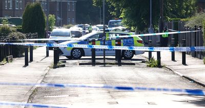 Four arrested after horror Manchester street shooting as terrified children flee indoors