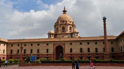 Central govt. officials protest outside North Block in the capital asking for promotion