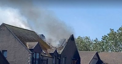 Residents evacuated after fire in block of flats in Scots town as public urged to avoid area