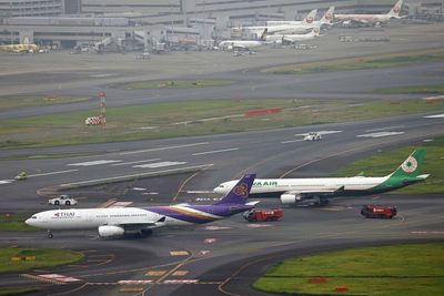 Runway closed at Tokyo's Haneda airport after 2 jets accidentally contact each other