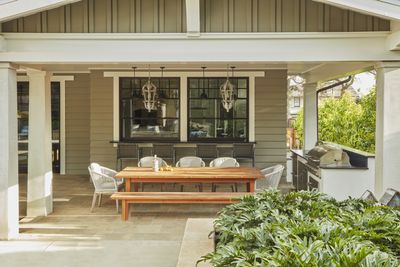 Should an outdoor dining table be in the sun or the shade? Design experts decide and offer a few simple workarounds