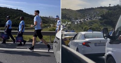 Man City fans forced to run on gridlocked motorway amid Champions League final chaos