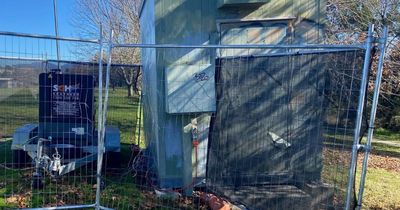 5G tower in Gordon torched, woman in black arrested