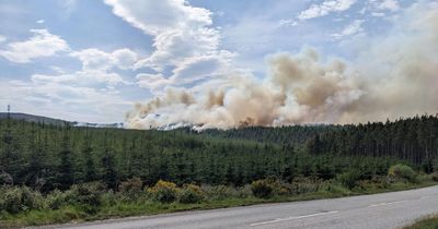 Fire crews still tackling massive Scots wildfire 'covering an area a mile long'
