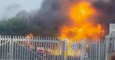 Huge fire with 'series of explosions' forces terrified residents to flee their homes