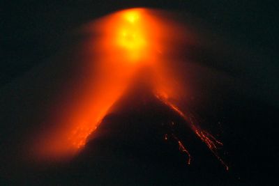 Philippines' Mayon Volcano spews lava down its slopes in gentle eruption putting thousands on alert