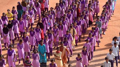 Students attend schools in the scorching sun on day one in A.P.