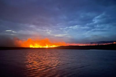 Firefighters continue to tackle Highlands wildfire raging for two days