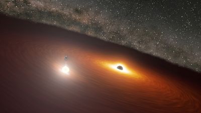 Brilliant gamma-ray flare 100 times brighter than our entire galaxy reveals 1 monster black hole is actually 2