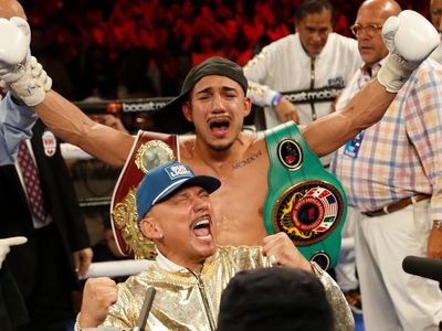 Teofimo Lopez and his father share emotional exchange during Josh Taylor fight