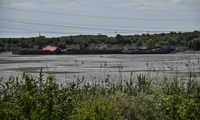 Skulls left scattered after Ukraine dam breach may be from second world war