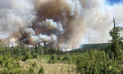 Quebec fires weakened by rain as blazes in western Canada force many to flee