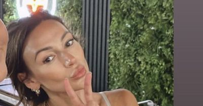 Michelle Keegan pouts for post-workout selfie as she stuns alongside lookalike cousin after exciting update with Mark Wright
