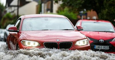 Thunderstorms batter UK with roads flooded and drivers abandoning submerged cars