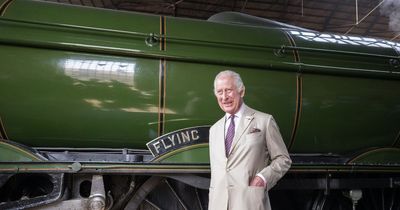 Kings clambers aboard Flying Scotsman after it tows Royal Train through countryside