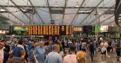 'Chaos' at 'extremely busy' Piccadilly Station as thousands attend Man City celebrations with trains delayed due to bad weather