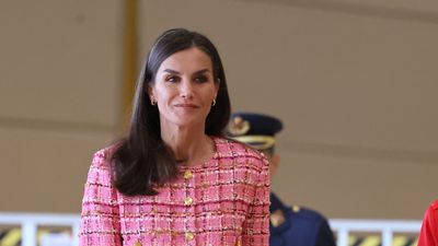 Queen Letizia's tailored beige leather dress features oversize stitching and we're obsessed!