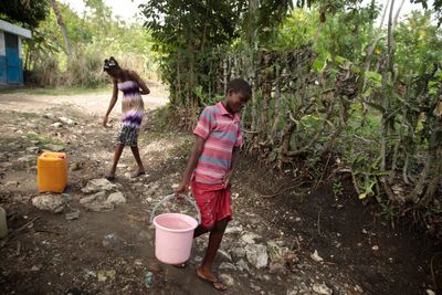 30,000 Haitian kids live in private orphanages. Officials want to shutter them and reunite families.