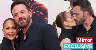 Ben Affleck gives Jennifer Lopez 'distracted kiss' through 'gritted teeth' on red carpet