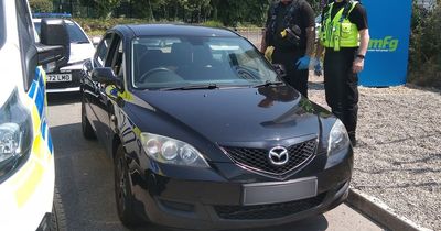 Car driven 'directly' at police officers as two men arrested and cash seized