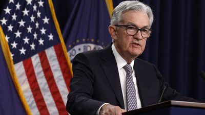 Federal Reserve holds interest rates steady, signals more hikes could be ahead