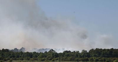 More than 50 firefighters tackling huge wildfire at nature reserve near Newcastle Airport