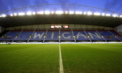 Wigan’s future secured after local billionaire Danson completes takeover