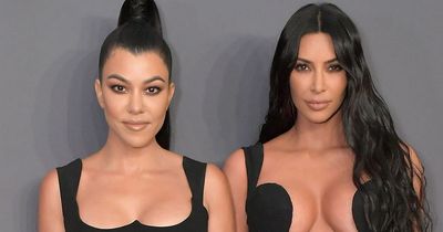 Kourtney Kardashian admits she 'tries to keep her distance' from 'crazy' Kim Kardashian