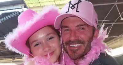 David Beckham risks wrath of trolls as he kisses daughter Harper on the lips at concert