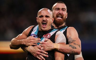 Port Adelaide sinks Geelong by 38 points to move top of AFL ladder