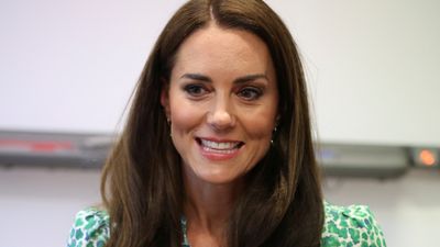 Kate Middleton's green patterned tea dress fuzes style and comfort as she steps out in the summer sunshine for an official engagement