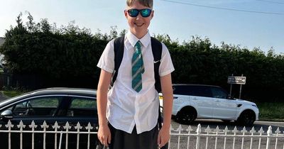 Boys wear skirts to school in protest at no shorts policies in heatwave