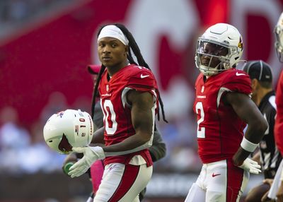 DeAndre Hopkins poses for photo with Matt Judon during Patriots visit