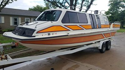 Bizarre Boat Is Part Dodge Van, Part Ford Mustang, And All Awesome